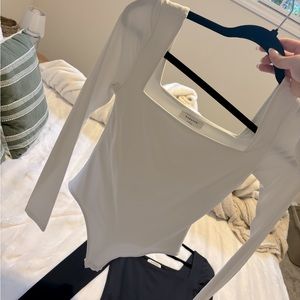 Babaton contour bodysuit in white.